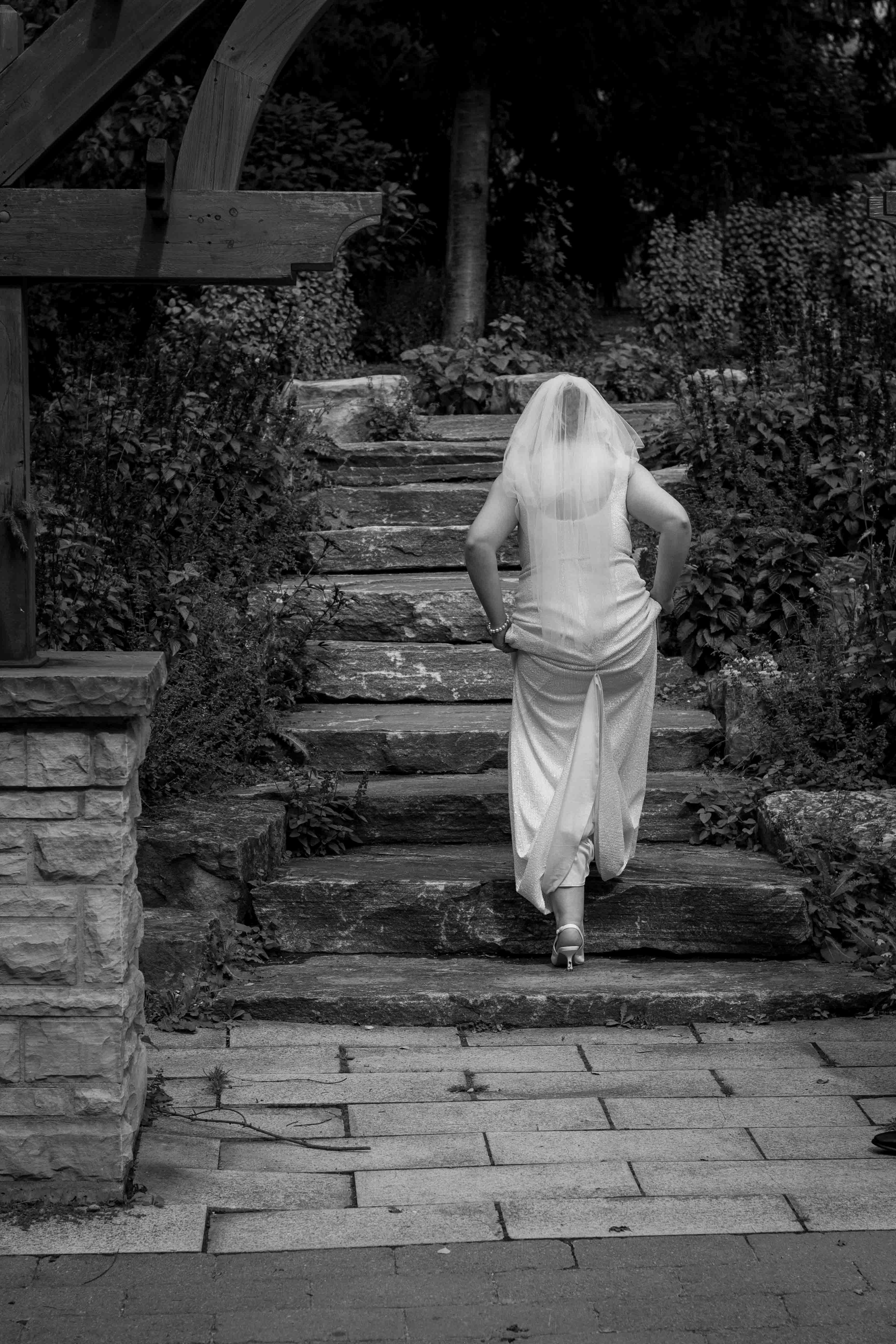 Photograph of Bride walking in Humber Arboretum in Toronto
